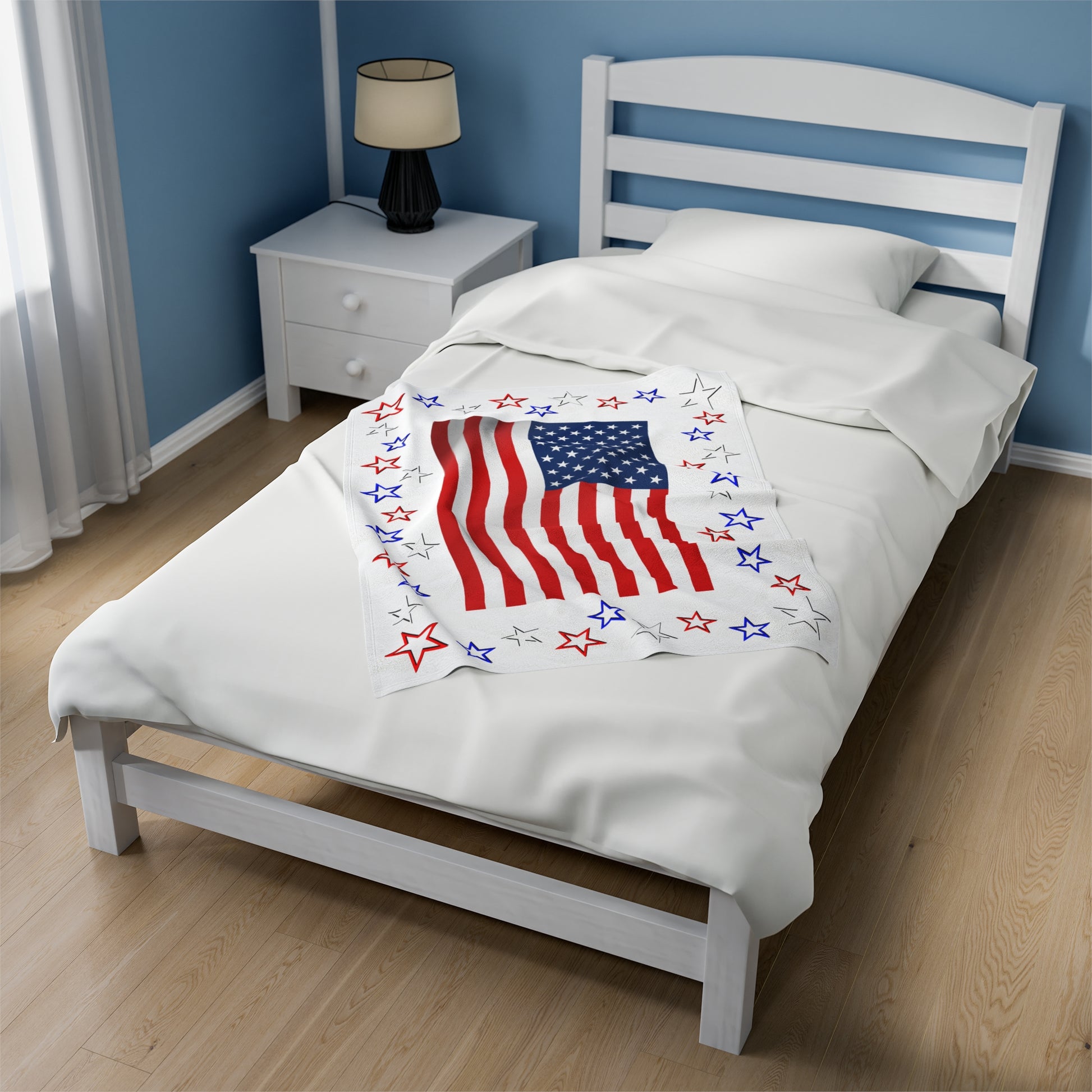 The centerpiece of this blanket is a beautifully designed USA flag. The flag is expertly centered, showcasing the iconic red, white, and blue stars and stripes.