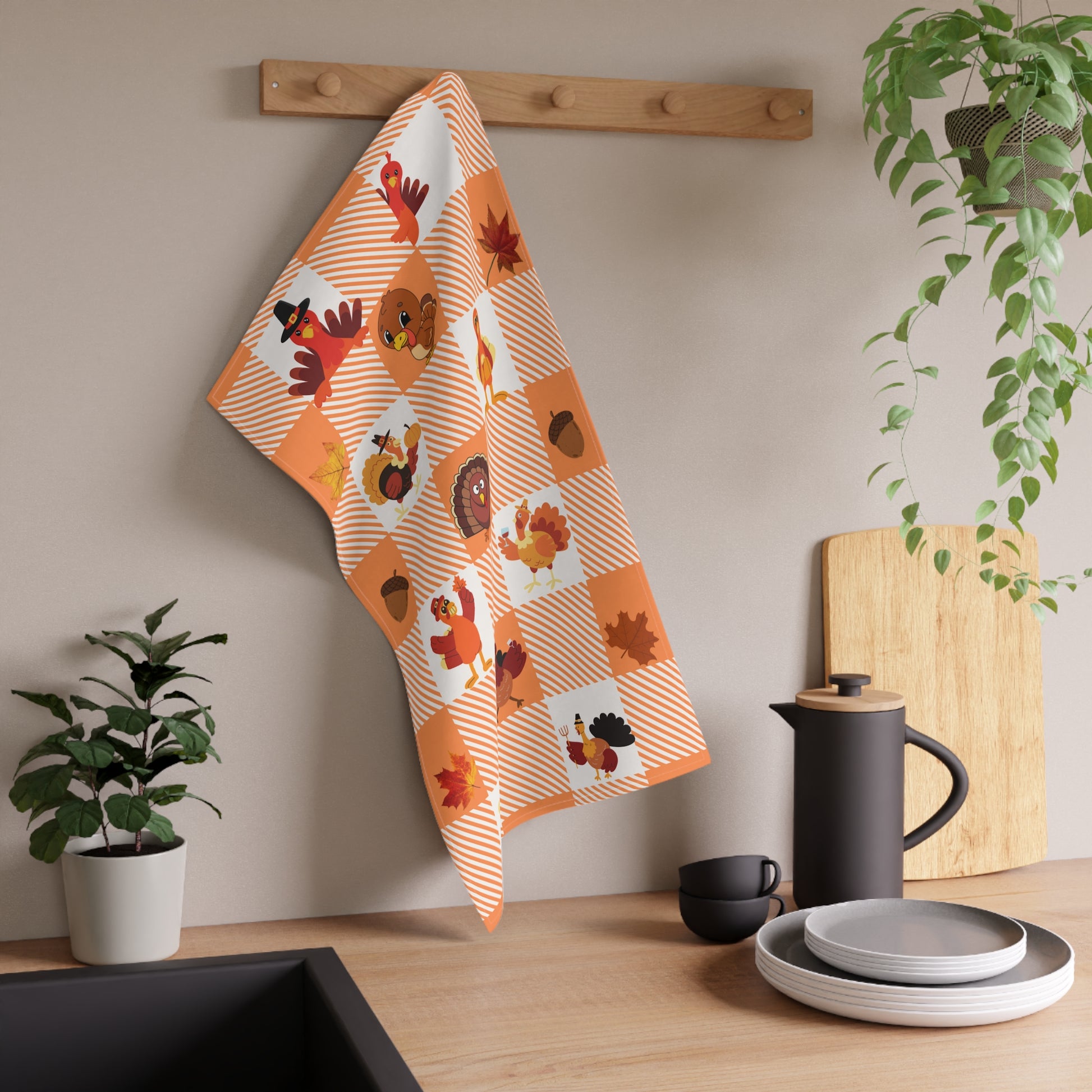 Embrace the spirit of autumn with this one-of-a-kind kitchen towel that brings a playful and cozy vibe to your home. Whether you're cooking up a Thanksgiving feast or simply adding a touch of seasonal charm to your kitchen, the "Turkey Trot" kitchen towel is a must-have.