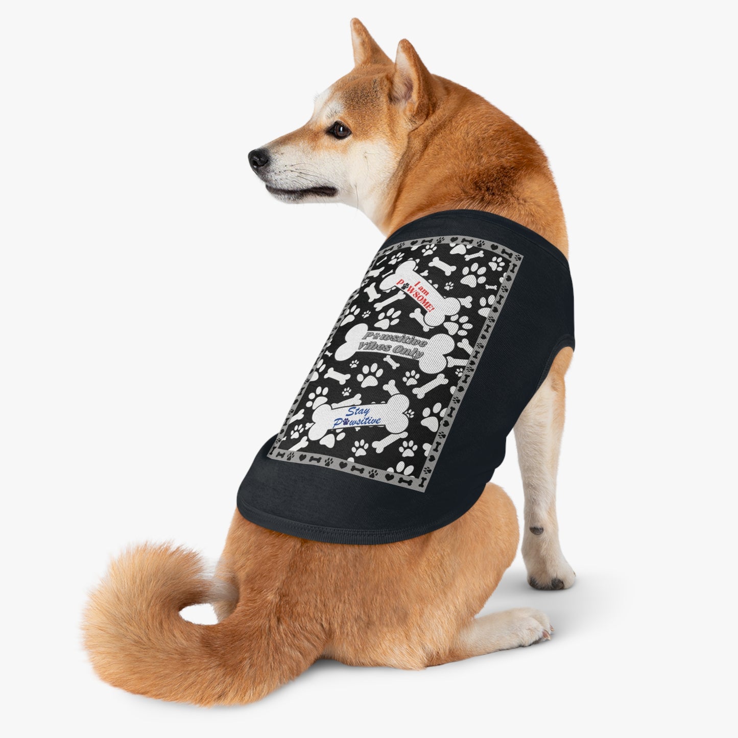  One bone proudly declares "I am pawsome," another encourages "pawsitive vibes only," and the third reminds us to "stay pawsitive." The black and white color scheme gives it a modern and stylish look. 