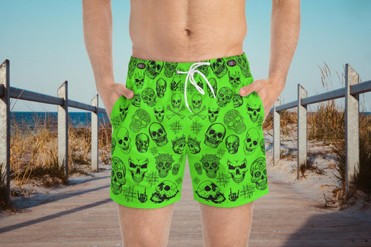 Unleash your bold side this summer with our Glowing Skulls Mens Bathing Suit, designed exclusively  by Chilis