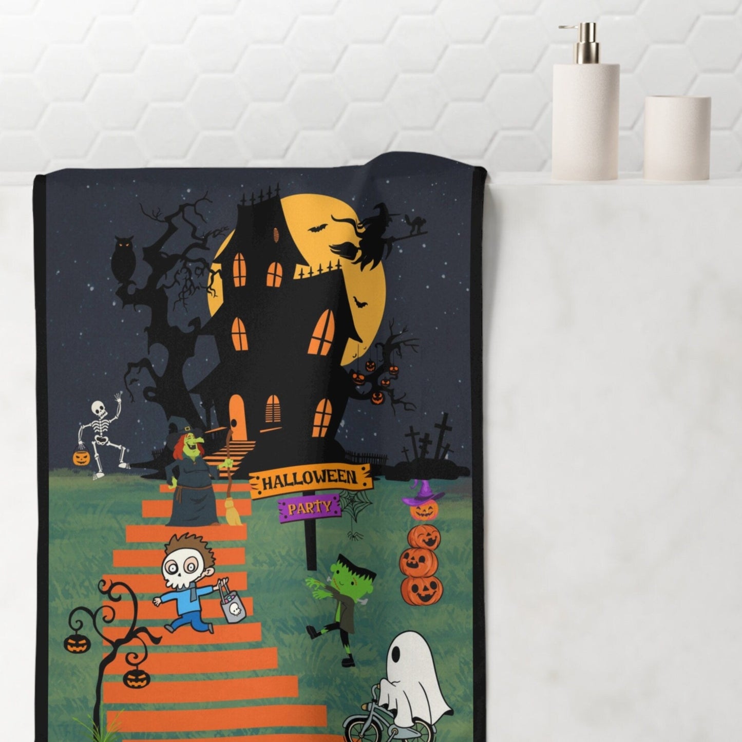 Introducing our exquisite "Haunted Hill Halloween" bath towel from Care and Wishes Boutique! Crafted with meticulous care, this towel is designed to add a touch of enchantment to your daily bathing routine.